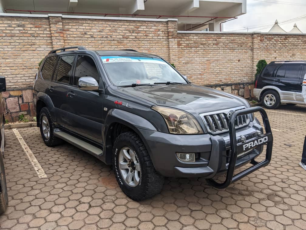 Toyota Land Cruiser Prado with rooftop tent on a dirt road for a 4x4 self driving Rwanda safari