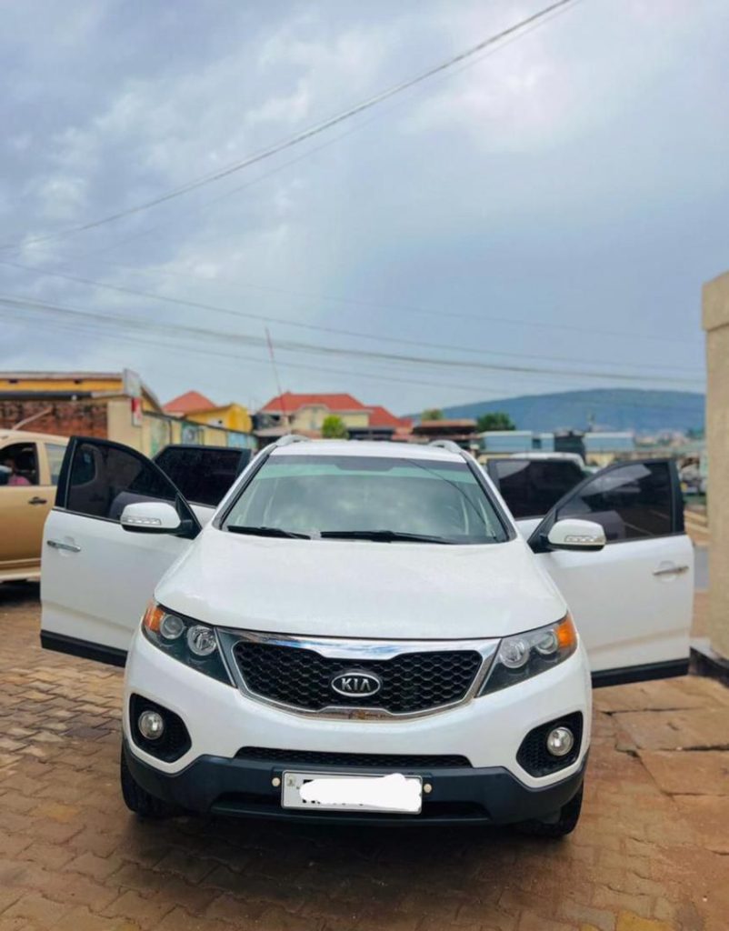 Rental SUV travelling on the road from Kigali to Rusizi in southwestern Rwanda