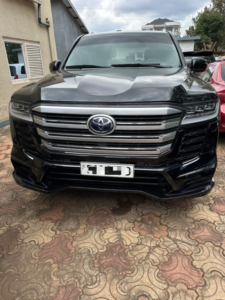 Business rental car parked outside an office in Kigali, Rwanda